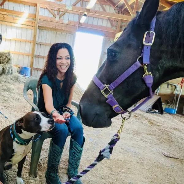 Christina Yoc Agency | Lick Creek Pet Lodge | Central ILLCPL Wellness | Lick Creek Pet Lodge | Central IL owner giving love to horse
